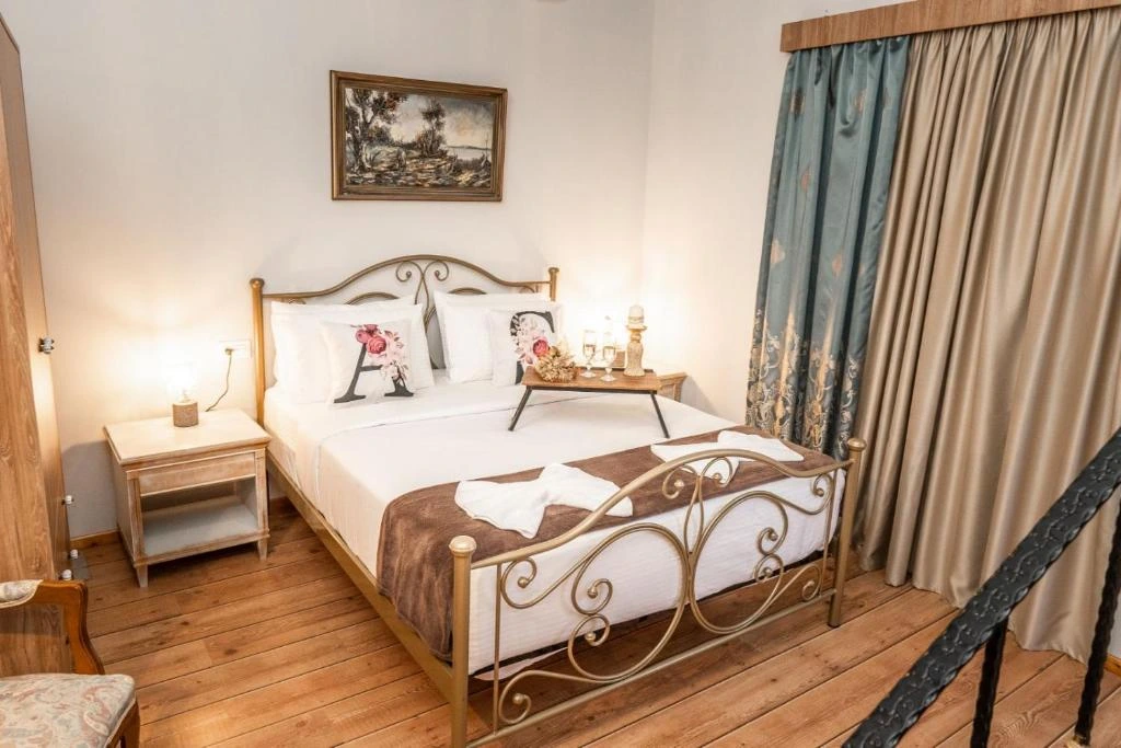 Traditional white-washed Greek villa vacation rental surrounded by olive trees