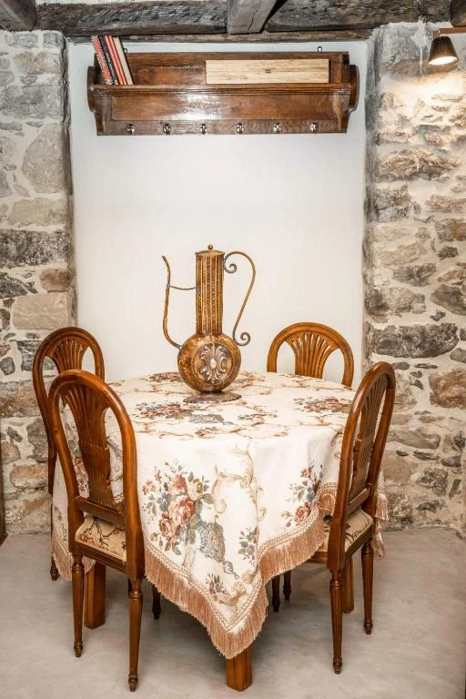 Traditional white-washed Greek villa vacation rental surrounded by olive trees