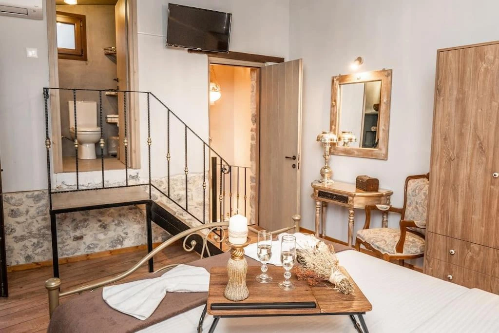 Traditional white-washed Greek villa vacation rental surrounded by olive trees